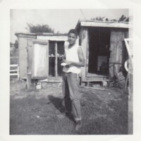 simms00174-boy-and-sheds.jpg